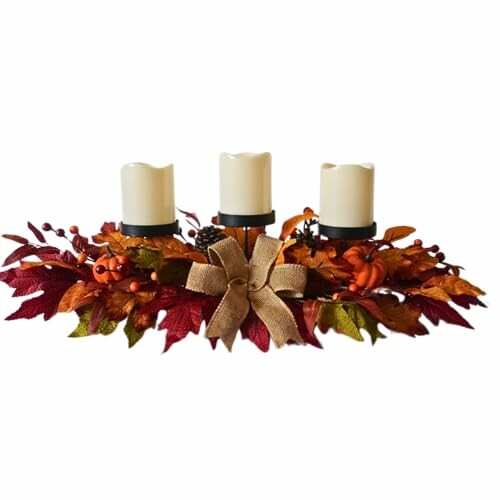 Autumn-themed candle centerpiece with leaves and berries