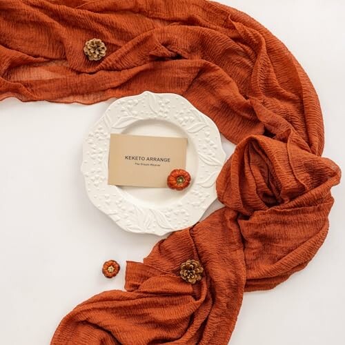 Orange fabric with decorative plate and card