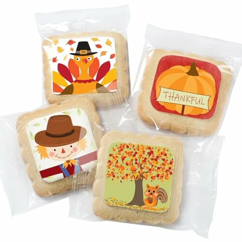 Four packaged cookies with Thanksgiving-themed designs, including pumpkins, fall trees, turkeys, and scarecrows.